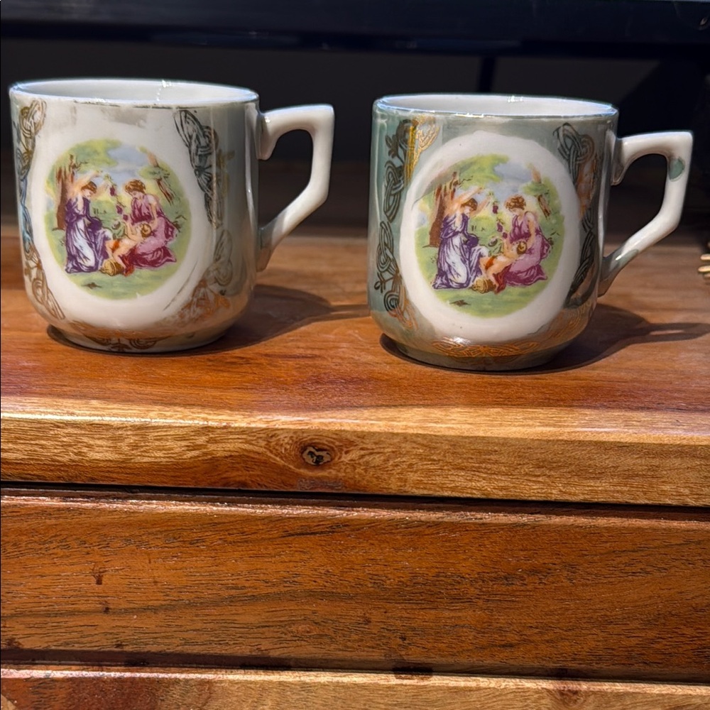 Vintage Porcelain Tea Cups with Artistic Design